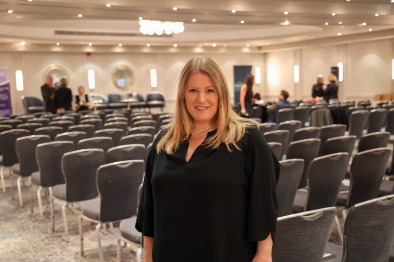 PCC Donna Jones wearing a black dress, smiling and looking at the camera at an event in Portsmouth